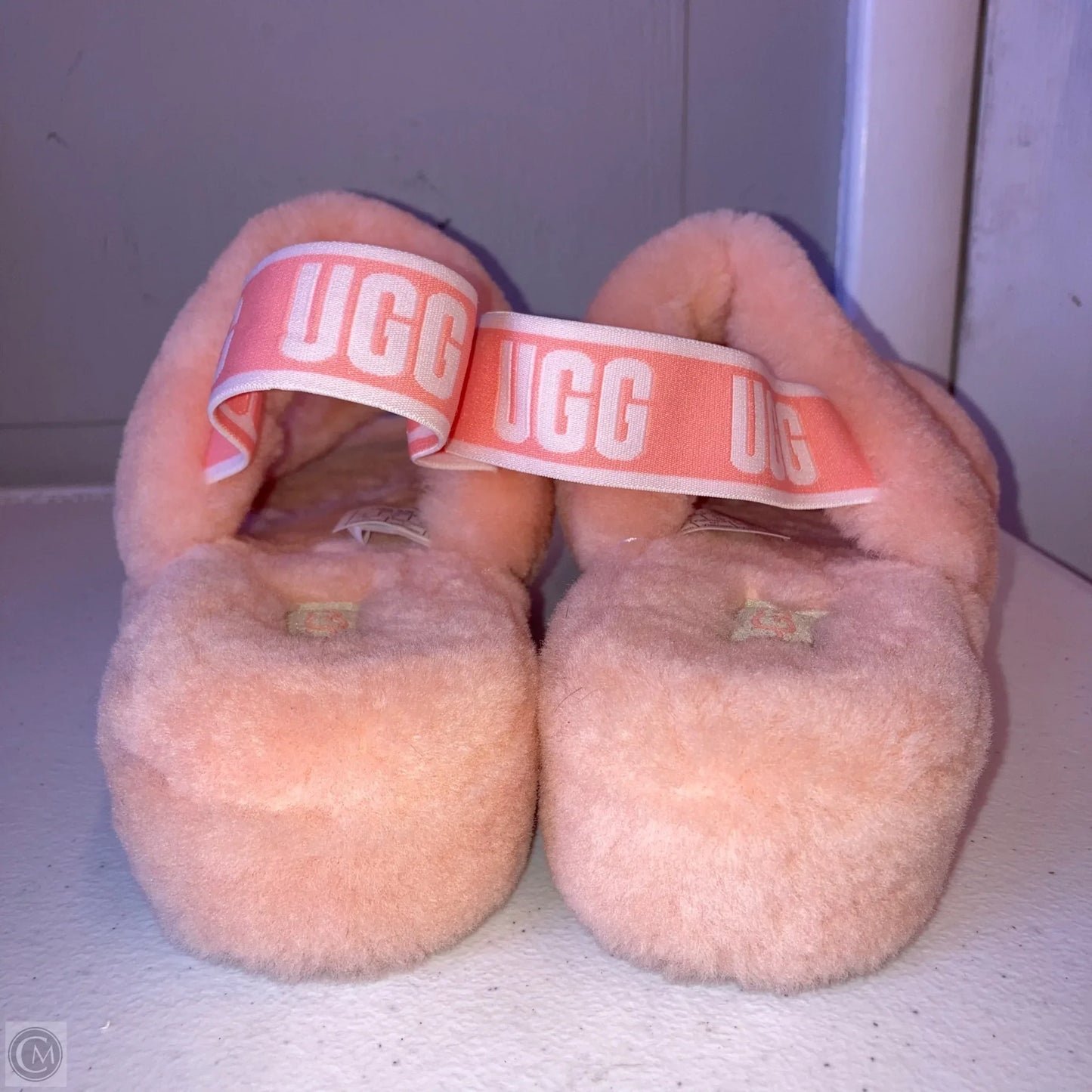 Slippers Designer By Ugg In Peach, Size: 9