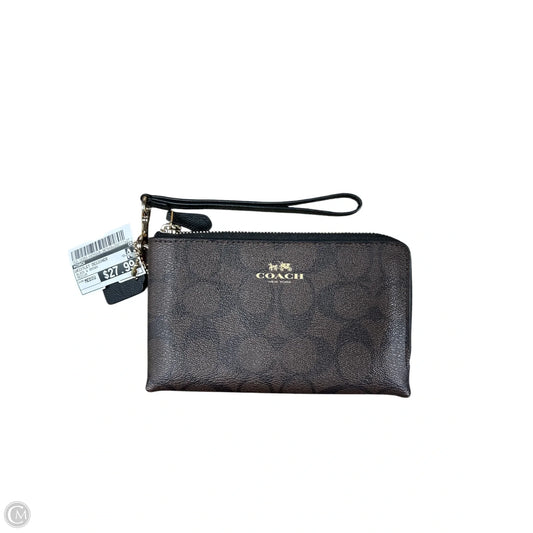 Wristlet Designer By Coach, Size: Medium