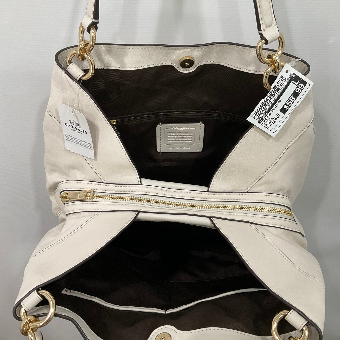 Handbag Designer By Coach, Size: Medium