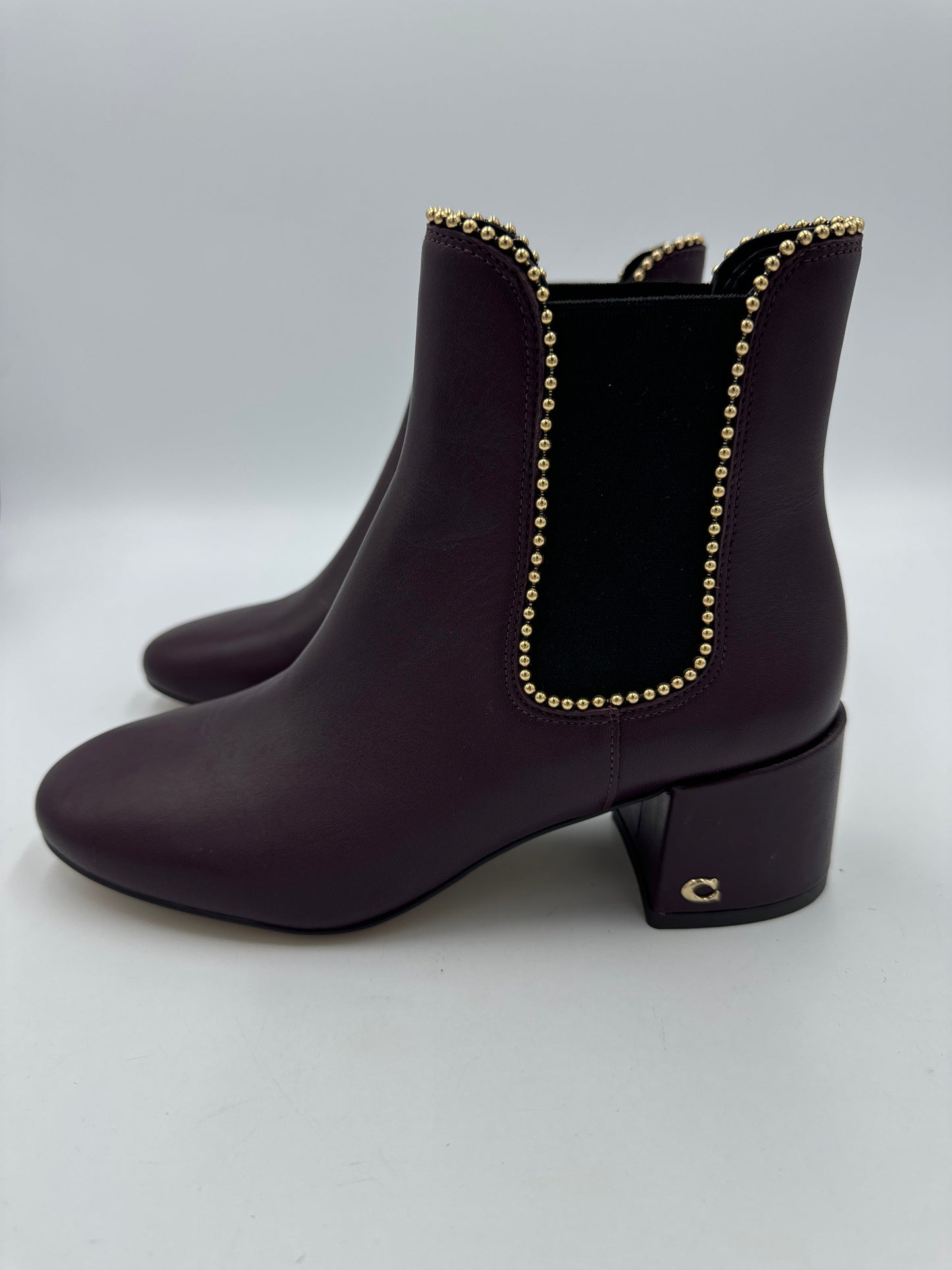 Boots Designer By Coach In Plum, Size: 5.5