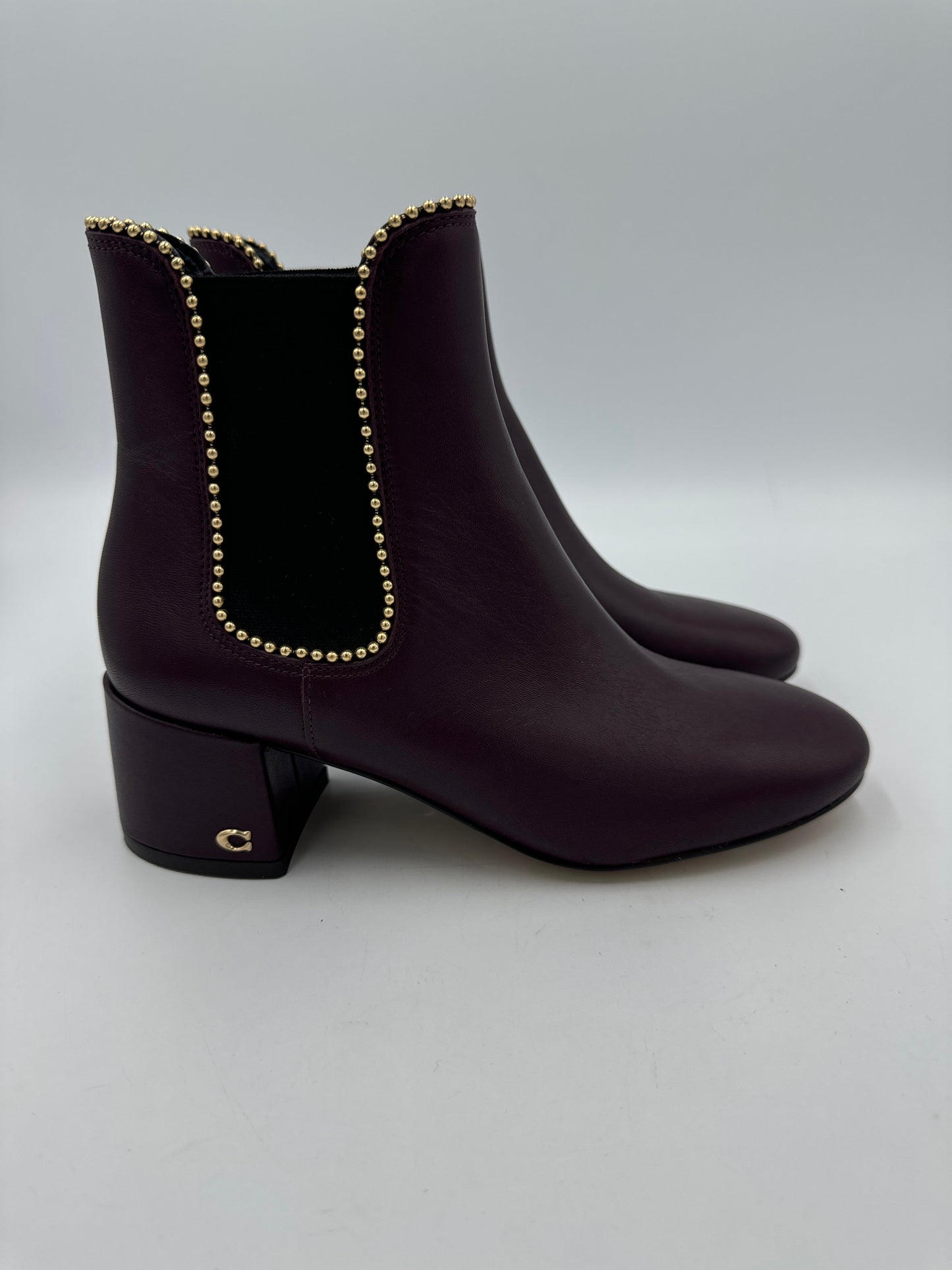 Boots Designer By Coach In Plum, Size: 5.5