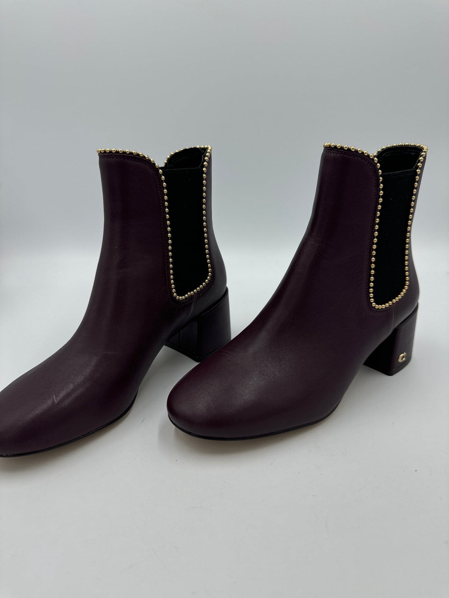 Boots Designer By Coach In Plum, Size: 5.5