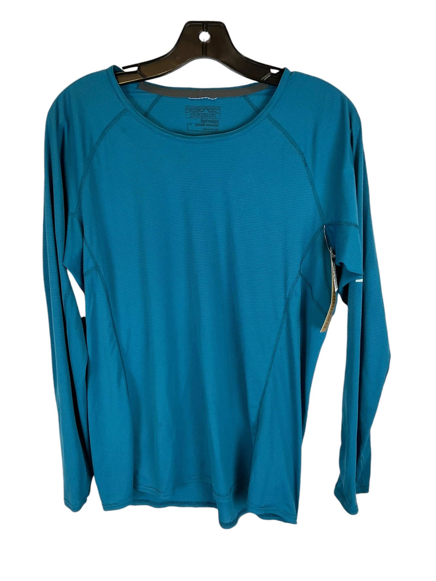 Top Long Sleeve Designer By Patagonia In Blue, Size: Xl