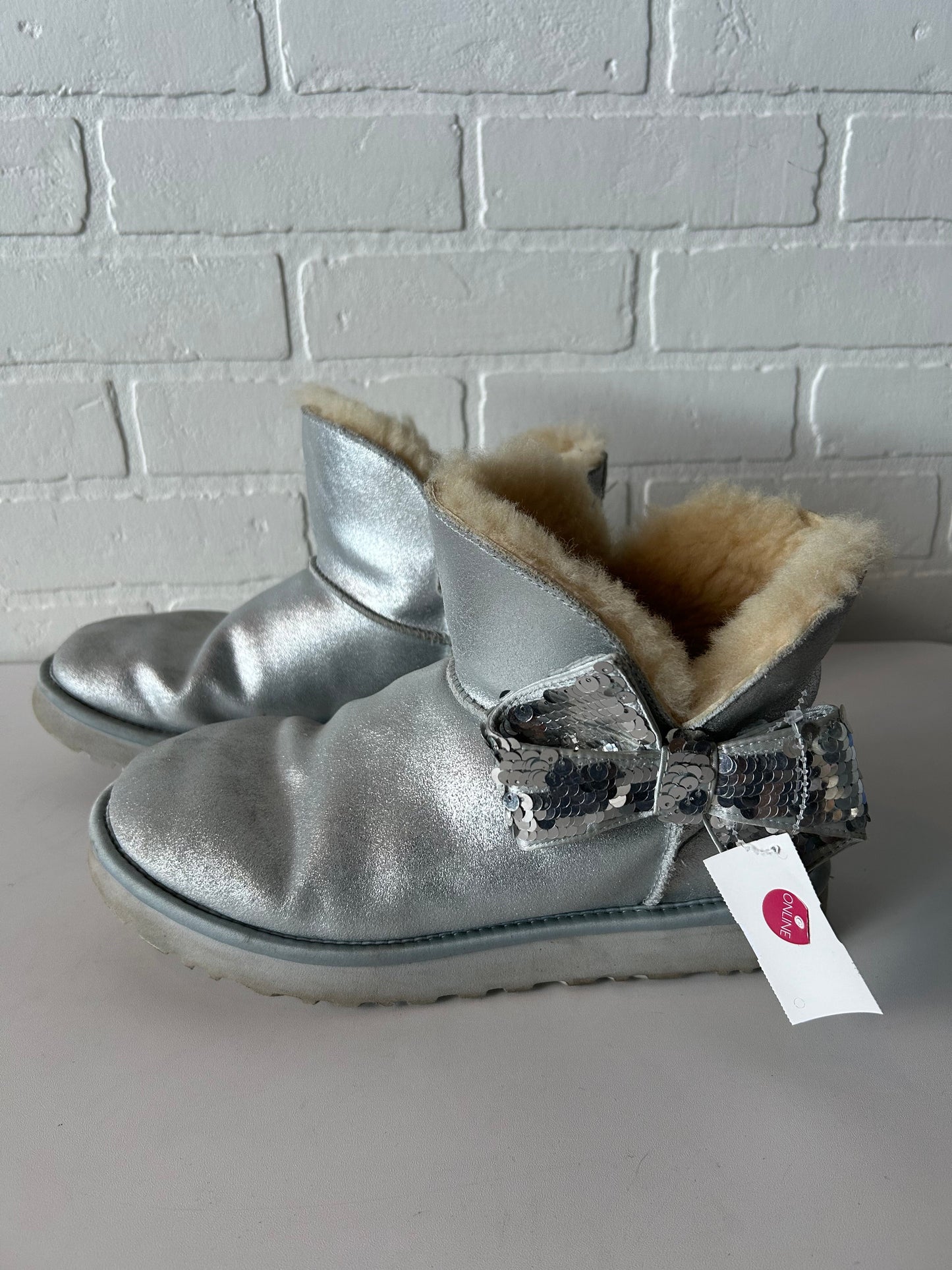 Boots Designer By Ugg In Silver, Size: 9