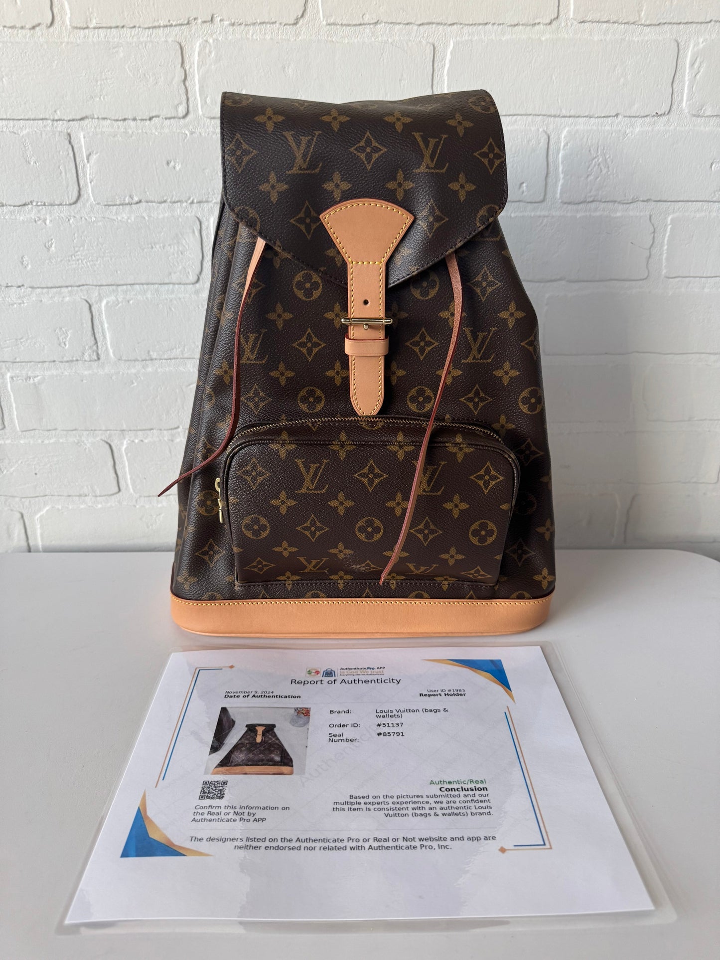 Backpack Luxury Designer By Louis Vuitton, Size: Medium