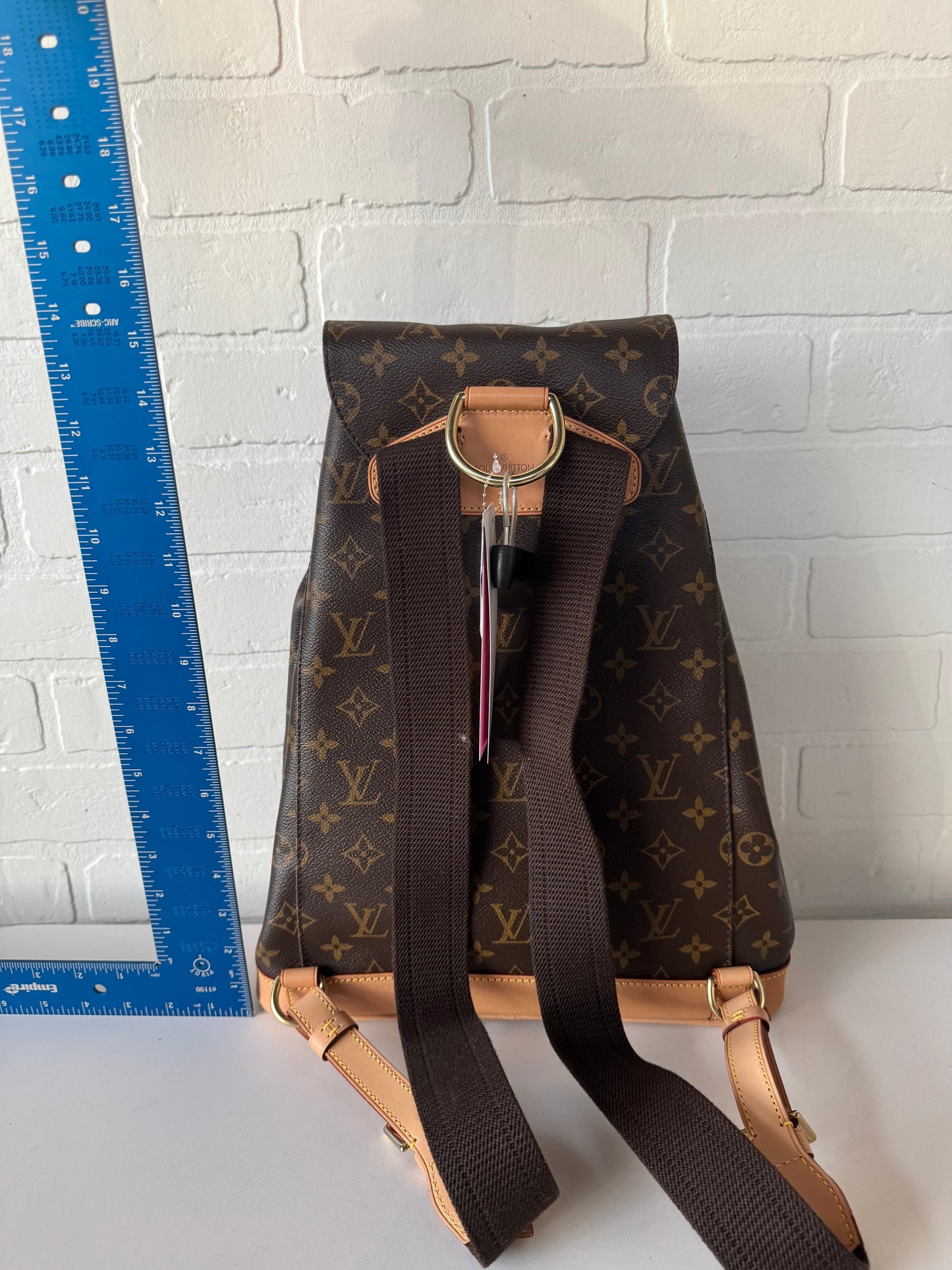 Backpack Luxury Designer By Louis Vuitton, Size: Medium