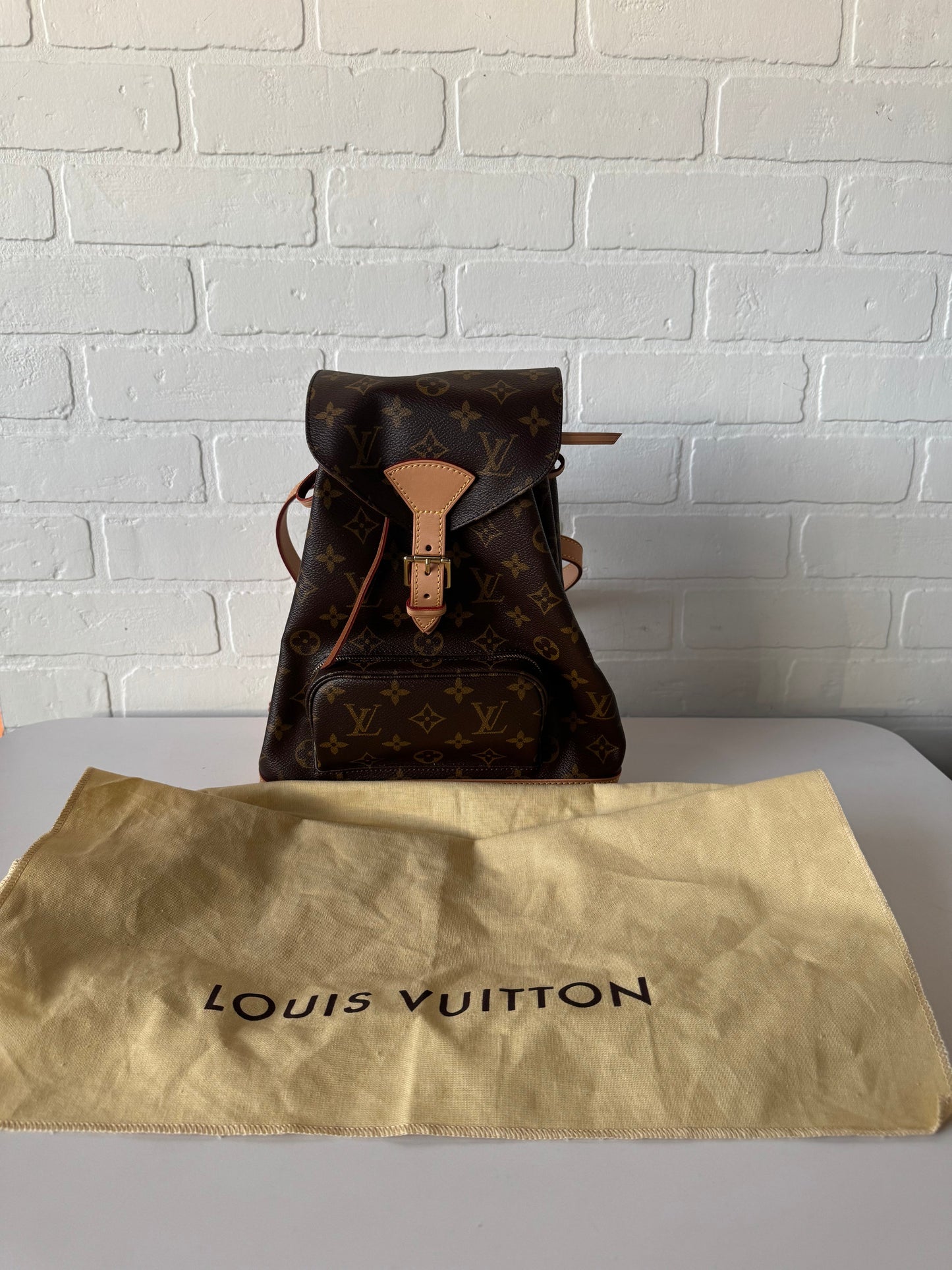 Backpack Luxury Designer By Louis Vuitton, Size: Small