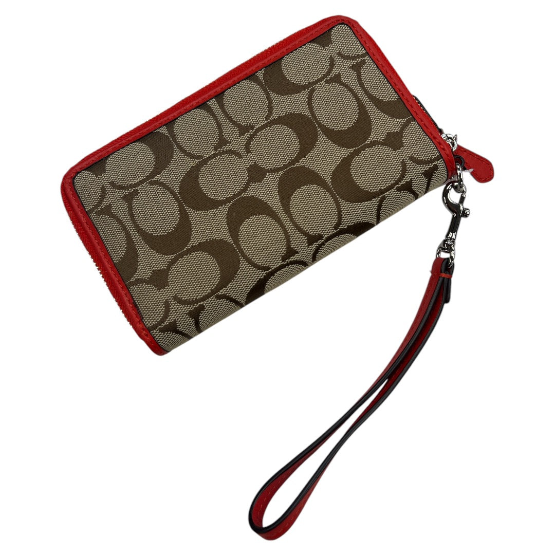 Wristlet Designer By Coach, Size: Medium