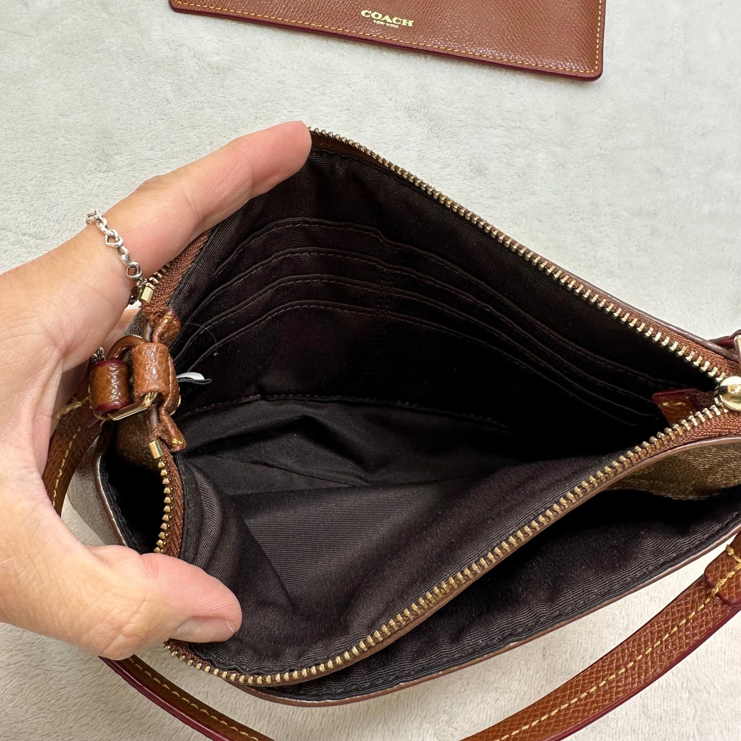 Clutch Designer By Coach, Size: Small