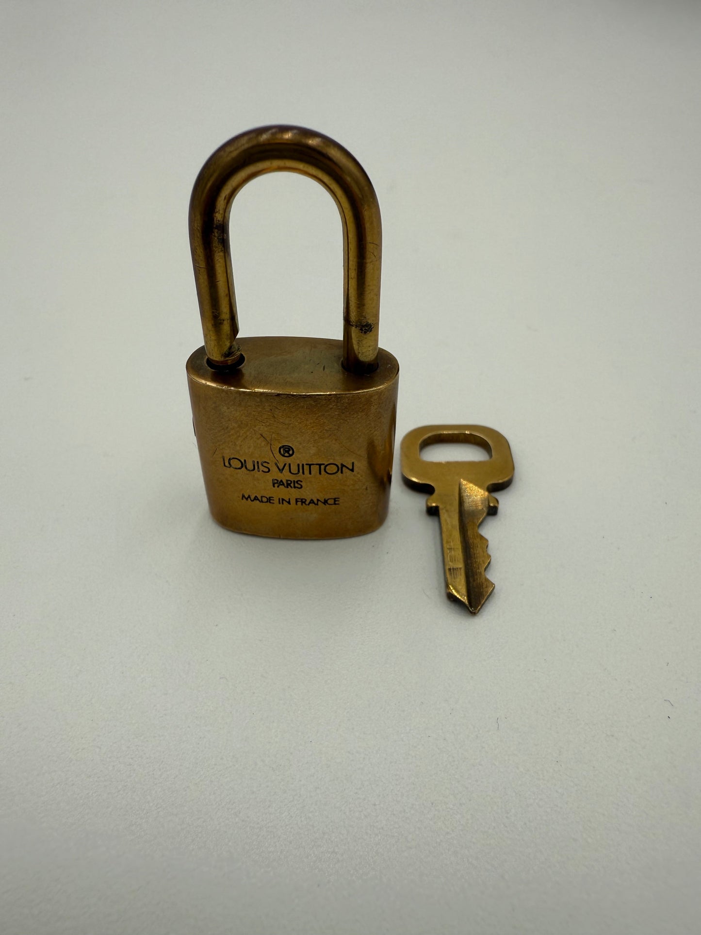 Accessory Luxury Designer Tag By Louis Vuitton In Gold