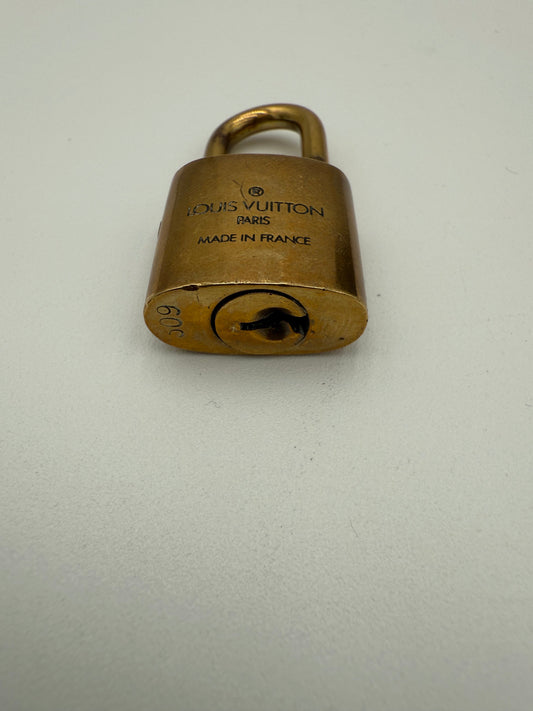 Accessory Luxury Designer Tag By Louis Vuitton In Gold